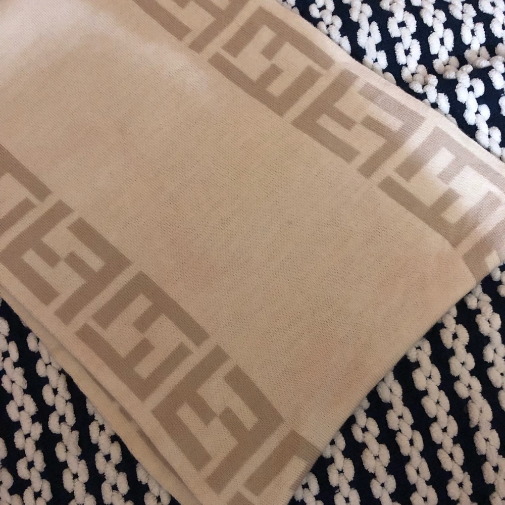Fendi Tan Knit Scarf a bit of blush got on the scarf. 100% Wool